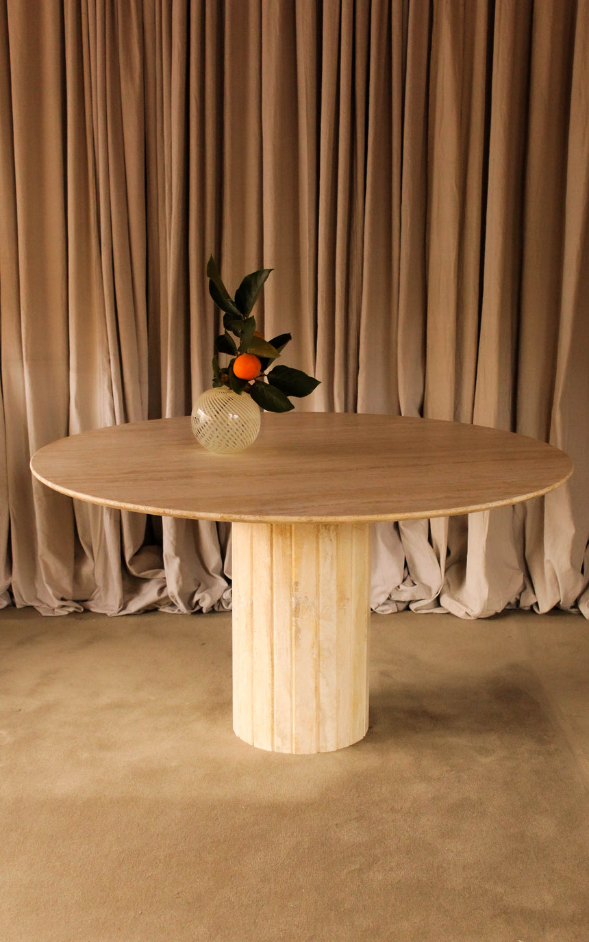 vintage honed unfilled travertine dining table tables stone flokati velvet modular sofa couch instagram piazza